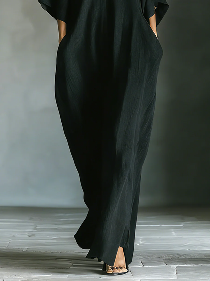 Alessandra • Vestito lungo nero oversize minimalista con maniche a kimono
