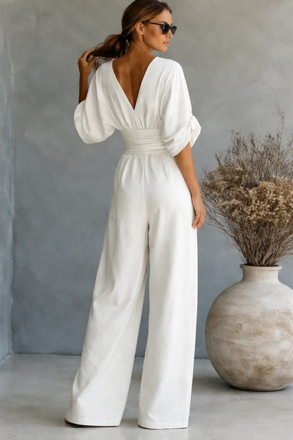 RISEL - Elegante tuta con scollo a V profondo